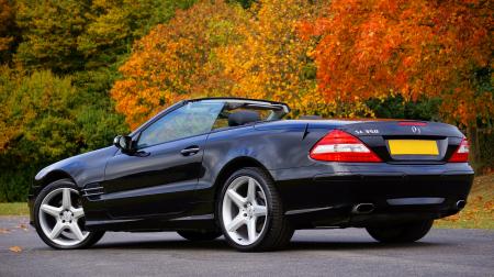 Black Mercedes Benz Convertible on Gray Concrete Floor