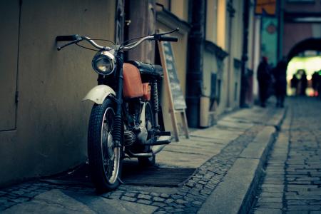 Black Orange Silver and White Motorcycle