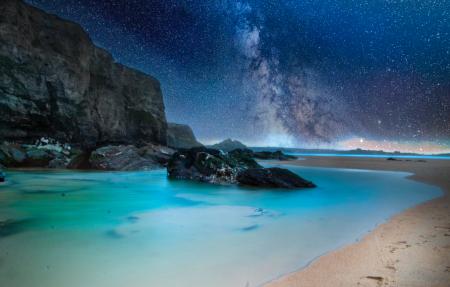 Black Stone on Body of Water during Nighttime