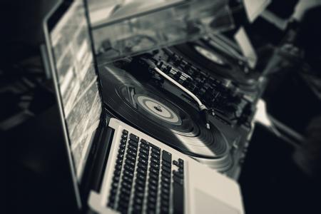 Black Turntable Beside White Laptop Computer