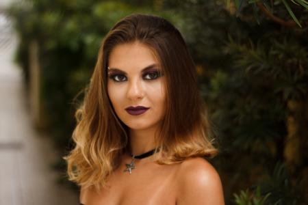 Blonde Haired Woman Posing for Photo