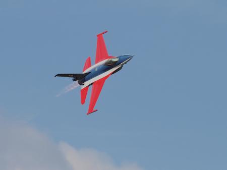 Blue Red Black and White Jet Plane on Air