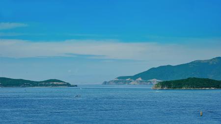 Blue Sea Near Mountains