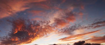 Blue sky with clouds and sun