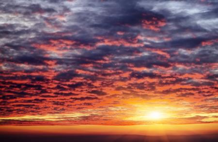Blue sky with clouds and sun