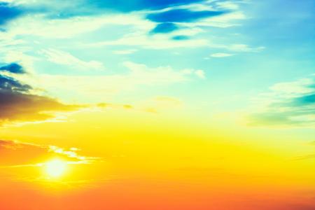 Blue sky with clouds and sun