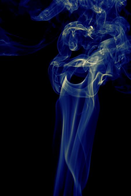 Blue smoke on black