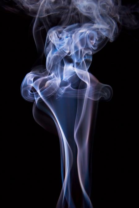 Blue smoke on black