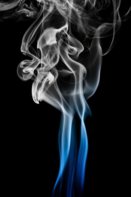 Blue smoke on black