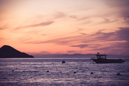 Boat on Sea during Golden Hour