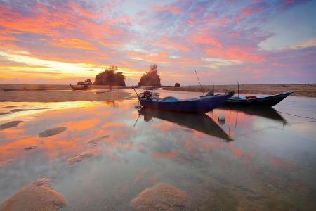 Boats on Body of Water during Sunset