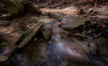 Body of Water Between Black Rock Artwork