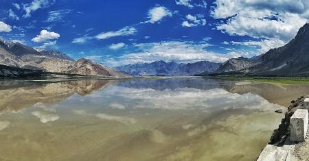 Body of Water Near Mountain