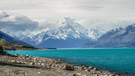 Body of Water Surrounded by Mountain