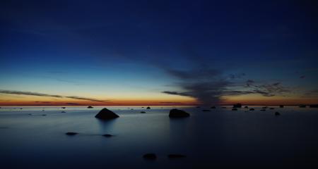 Body of Water Under Blue Skies during Golden Hour