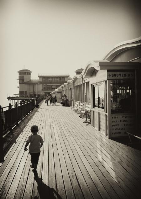 Boy Near Booth Standing at Daytime