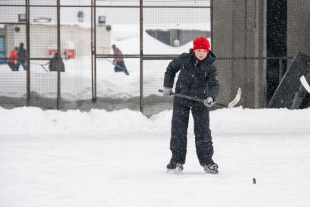 boy playing ice hockey