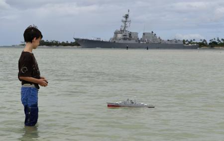 Boy Playing with the Ship