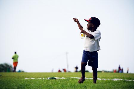 Boy plays kite