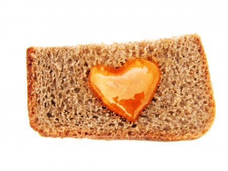 Bread with heart shaped honey
