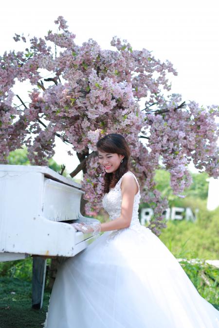 Bride playing the piano
