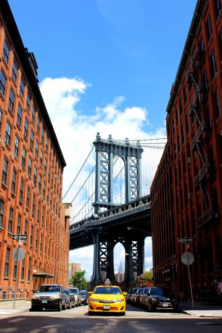 Bridge by Two Red Brick Buildings