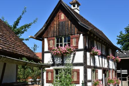 Brown and White Wooden House Under Blue Sky at Daytime