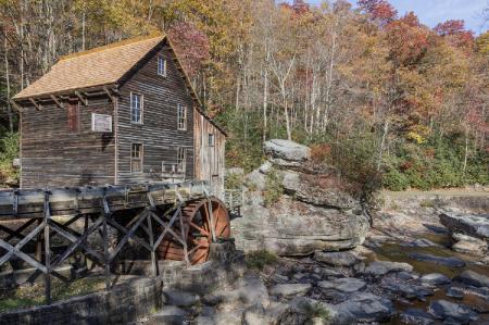 Brown Cabin Under Water Wheel