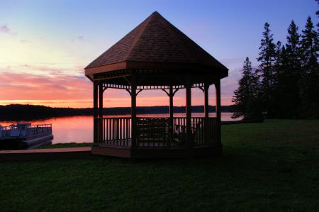 Brown Canopy Tent Near on Body of Water