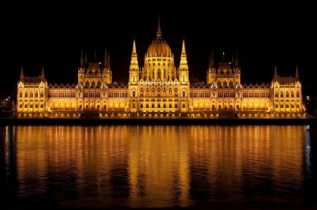 Brown Lighted Dome Near Body of Water