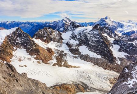 Brown Mountains Under White Sky