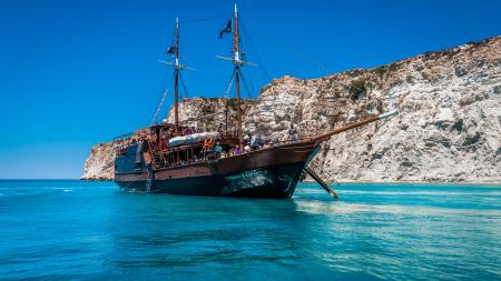 Brown Ship on Body of Water