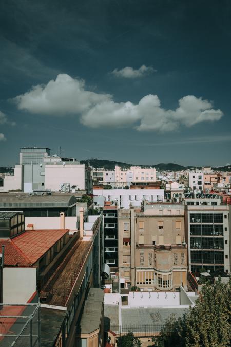 Brown, White, and Black Concrete High Rise Buildings