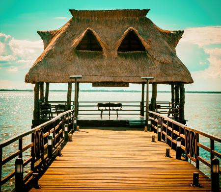 Brown Wooden Hut On Pier