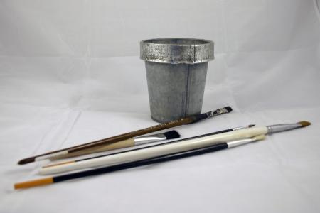 Brushes and a tin can