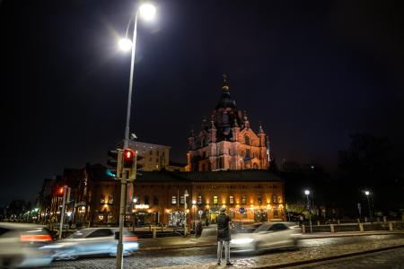 Building on Night Time With Cars Passing