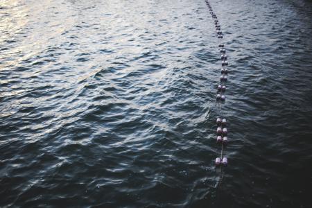 Buoys floating on top of the water