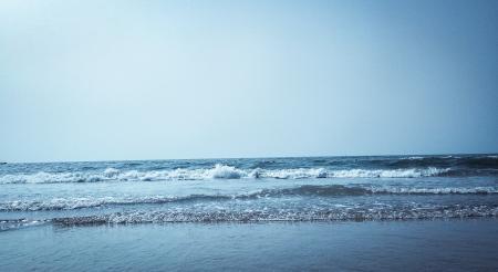 Calm Water on Seashore at Daytime