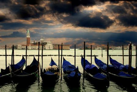 Canoes Docked in Water Near Concrete Structures