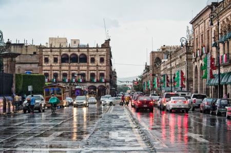 Cars and People on Rainy Day