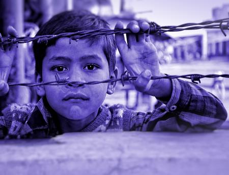 Child and Barbed Wire