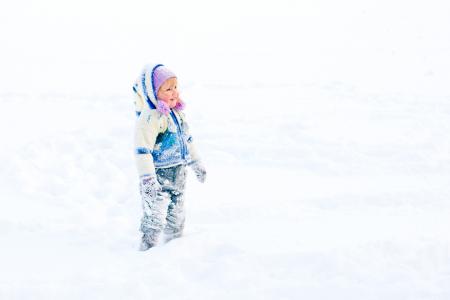 Child Playing in Winter