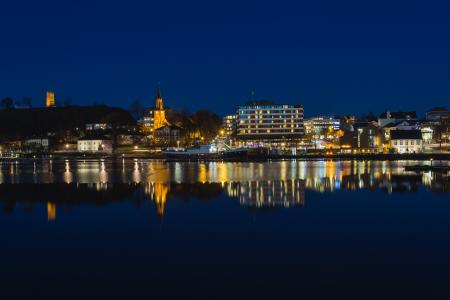 City Skyline and River at Night