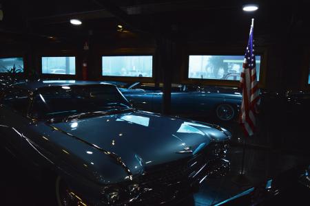 Classic Gray Chevrolet Car Near Us Flag Inside Garage
