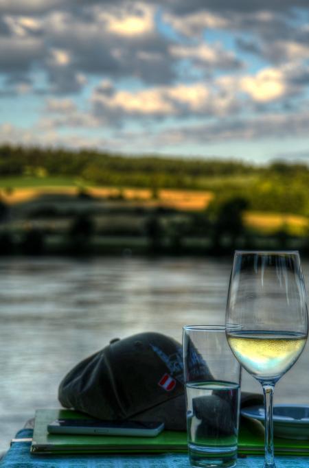 Clear Wine Glass Near Baseball Cap