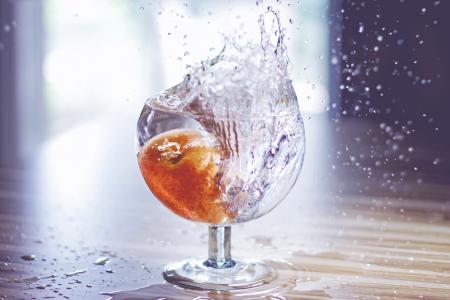 Close-up of Water Splashing in Glass