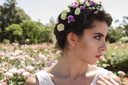 Close Up Photo of Woman With Floral Headband