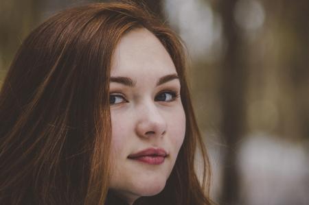 Close Up Photo of Woman's Face