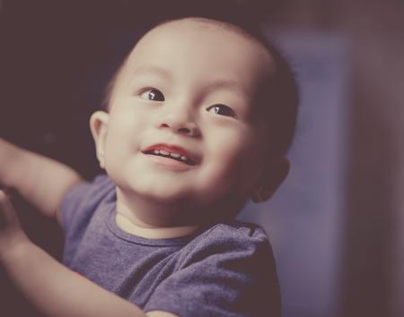 Close-Up Photography of a Smiling baby