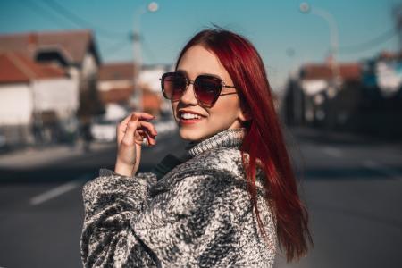 Close-up Photography of a Woman in the middle of the Road